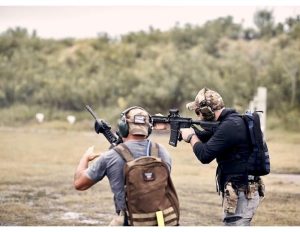 Competitors during the Ruck N Gun capstone event at GORUCK Capstone Tactical Weekend