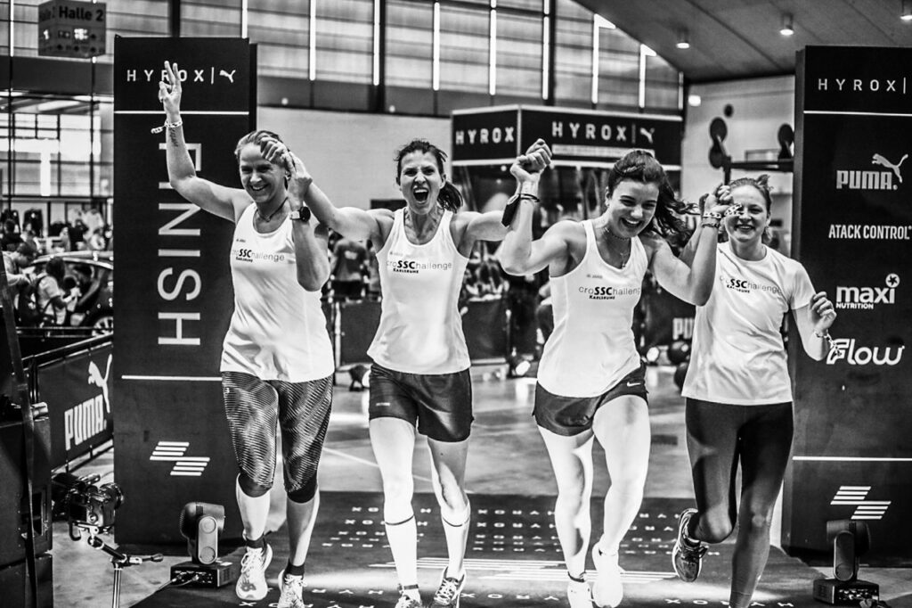 Relay team finishing the HYROX race