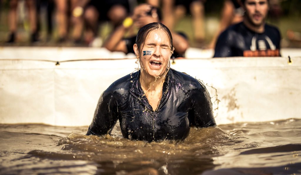 Tough Mudder Toronto participants tackling an obstacle