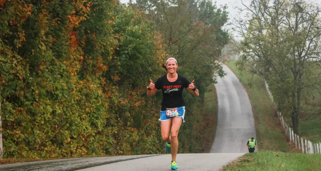 Runner on a Kentucky country road during the Ragnar Road Bourbon Chase relay