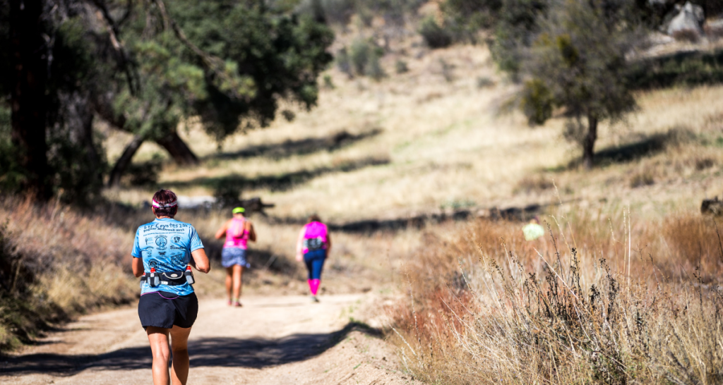 Runners on a high desert trail at Ragnar Trail SoCal