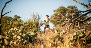 Runner on ranch trail at Ragnar Trail Texas Hill Country